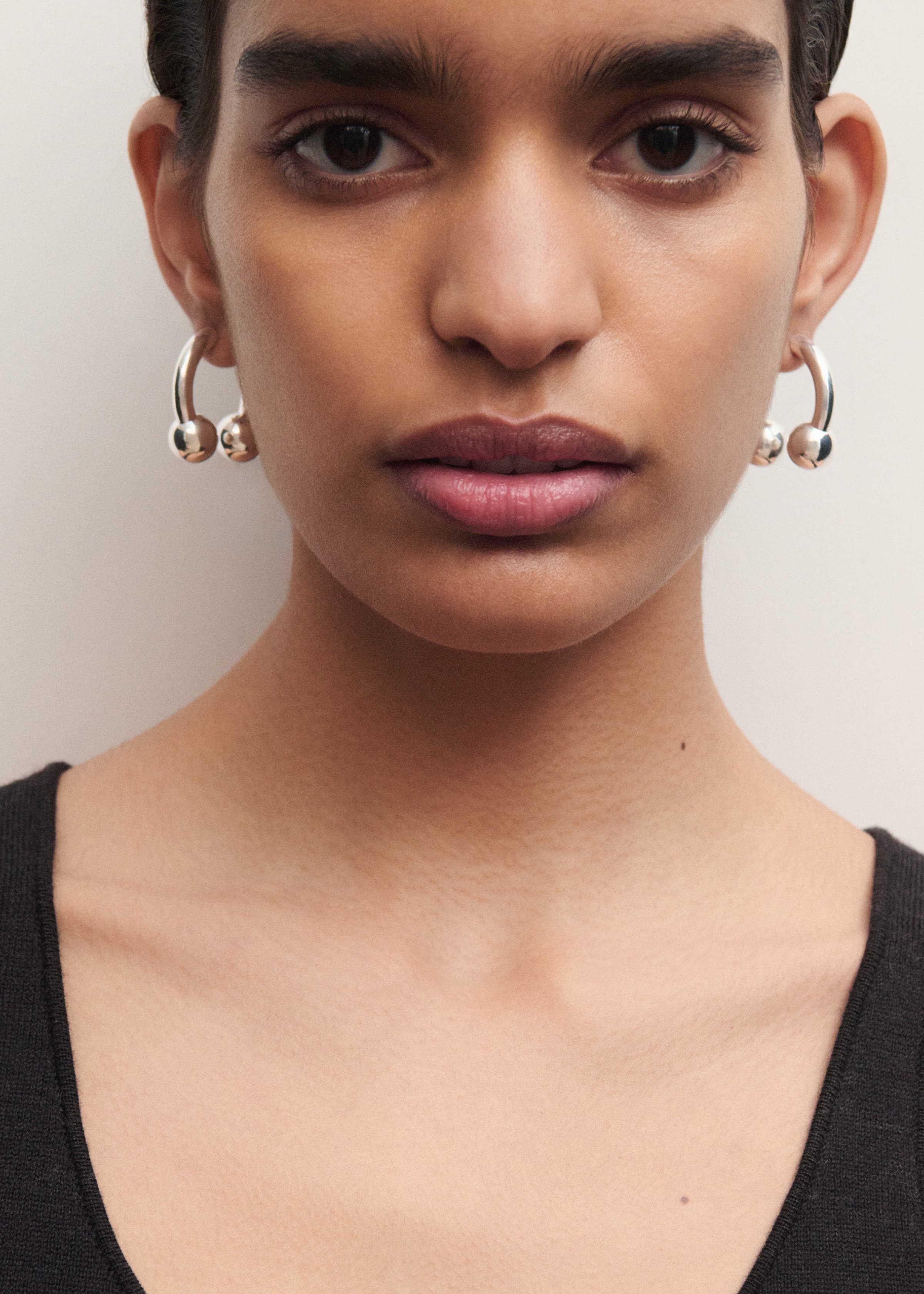Pearl earrings split